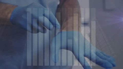 Animation of statistical data processing against mid section of male surgeon Stock Footage 327277992