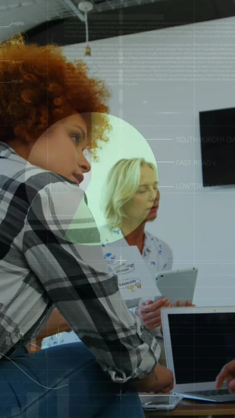 Animation of statistical data processing against two diverse men discussing at Stock Footage 344706605