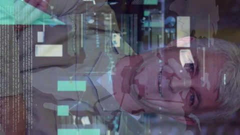 Animation of statistical data processing over caucasian male worker smiling at Vidéo 312411199