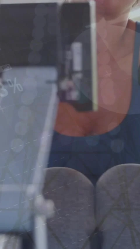 Animation of statistical data processing over caucasian fit woman using rowing Stock-Footage 344693235