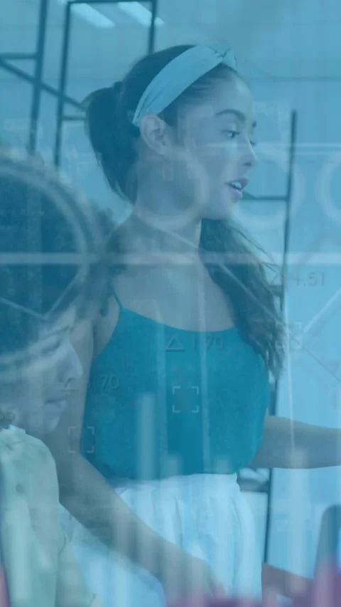 Animation of statistical data processing over diverse colleagues discussing Stock Footage 344745662