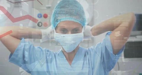 Animation of statistics and data processing over caucasian female surgeon Stock Footage 309076834