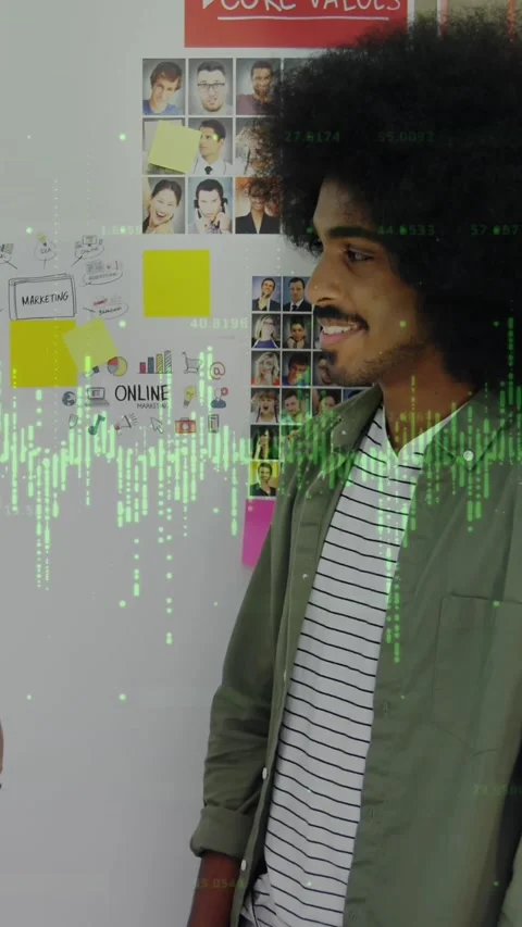 Animation of statistics and data processing over business people wearing phone Stock Footage 343084228
