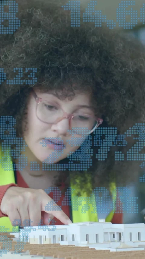 Animation of statistics and data processing over female architect in office Stock Footage 343713745