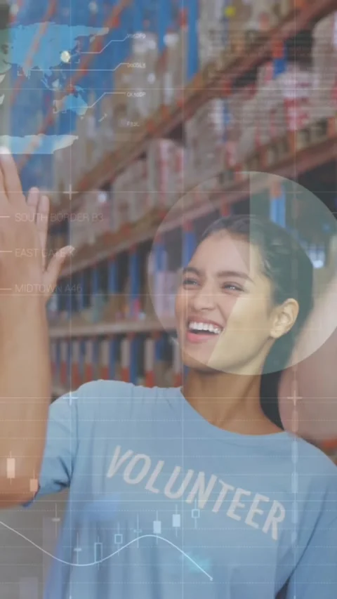 Animation of statistics and data processing over diverse volunteers high fiving Stock Footage 344745370