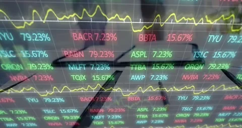 Animation of statistics and financial data processing over notebook on desk in Stock Footage 327897640