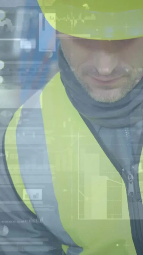 Animation of statistics and financial data processing over man working in Stock Footage 342009638