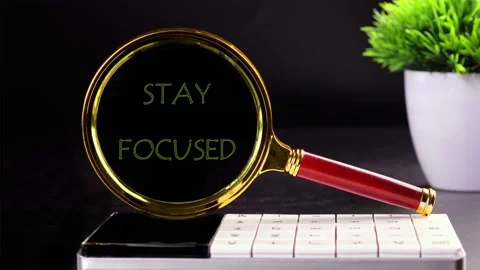 Animation of the STAY FOCUSED text. Explore key concepts in business finance as Stock Footage 297348943