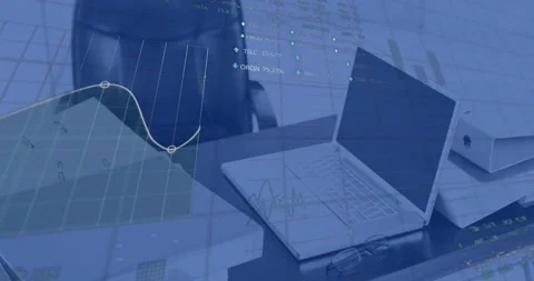 Animation of stock market data processing against laptop and documents on office Stock Footage 229830497