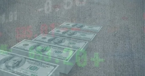Animation of stock market data processing over stack of dollar bills against Stock Footage 242020238