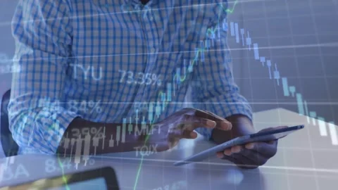 Animation of stock market data processing against african american man using a Vídeos de archivo 253526711