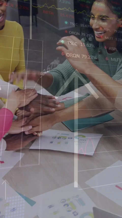 Animation of stock market data processing over diverse colleagues stacking their Stock Footage 321039139