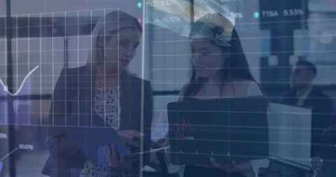 Animation of stock market data processing over two diverse female colleagues Video stock 326411958