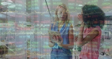 Animation of stock market data processing over two diverse women discussing over Vidéo 327202333