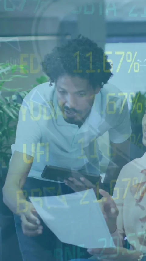 Animation of stock market data processing over diverse male and female Stock Footage 342009944
