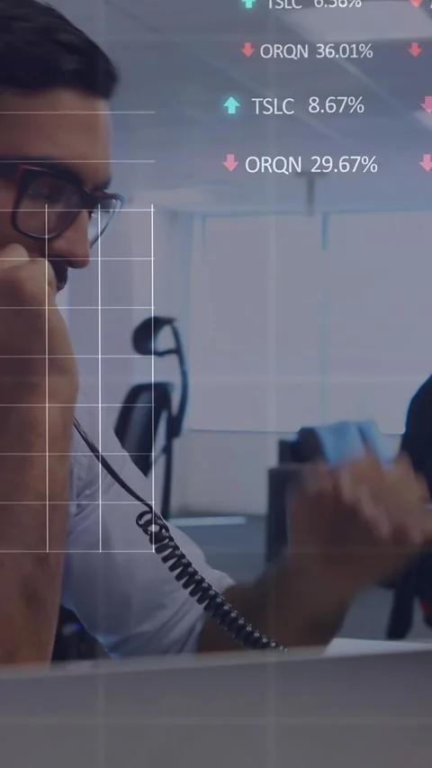 Animation of stock market data processing over stressed man talking on phone at Stock Footage 343867424