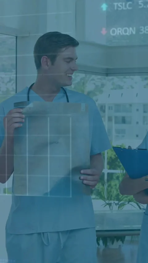 Animation of stock market data processing over team of diverse doctors Stock Footage 344678337