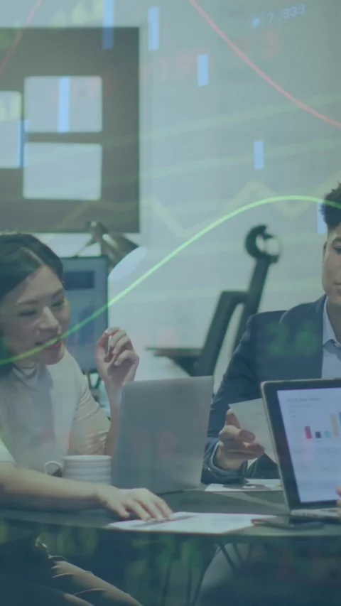 Animation of stock market data processing over group of diverse colleagues Stock Footage 344723716