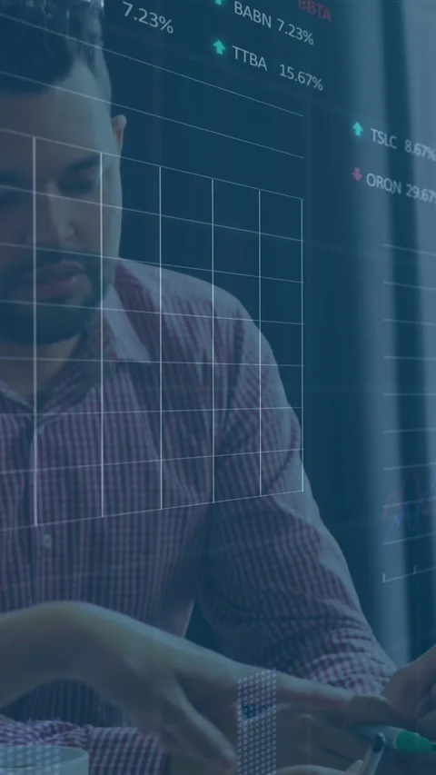 Animation of stock market data processing over diverse colleagues discussing Stock Footage 344775291