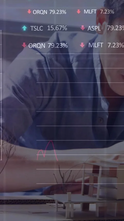 Animation of stock market data processing over asian male architect working on Stock Footage 344783181