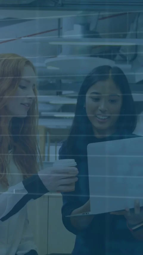 Animation of stock market data processing over two diverse women discussing over 스톡 동영상 344803540