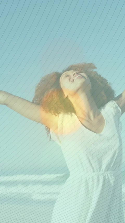 Animation of striped patterns over young woman with arms outstretched spinning Stock Footage 344693186