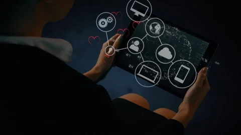 Animation of tech icons with connections over hands of caucasian woman using Stock Footage 330247836