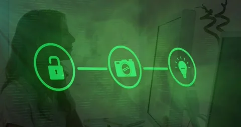 Animation of tech icons over caucasian woman working on computer Stock Footage 329849915