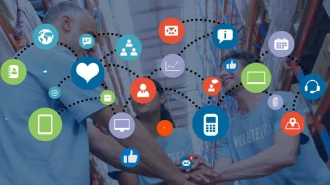Animation of tech icons over happy diverse female and male warehouse workers Stock Footage 327061421