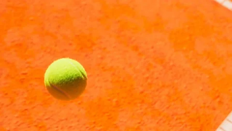 Animation of tennis racket stops bouncing ball on the court. Render 4K HD Stock Footage 133387416