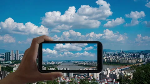 Animation of Touchscreen Smart Phone record video on time lapse. at Seoul city Stock Footage 139724315