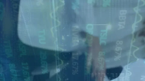 Animation of trading board, binary code, database over caucasian coworkers Stock Footage 313170300