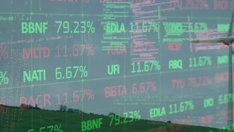 Animation of trading board, computer language over windmill on green mountain Stock Footage 329418148