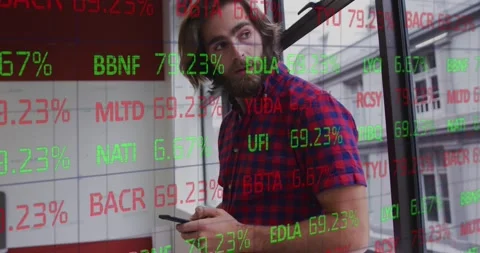 Animation of trading board on grid pattern over caucasian man using cellphone in Stock Footage 232548282