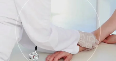 Animation of triangles and scope scanning over doctor and female patient Stock Footage 329706207