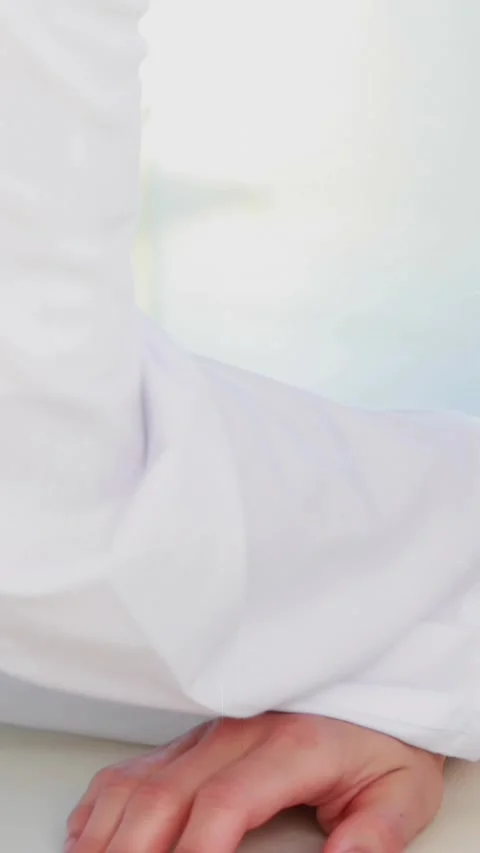 Animation of triangles and scope scanning over doctor and female patient Stock Footage 343920422