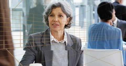 Animation of tunnel in seamless pattern over senior businesswoman talking at a 動画素材 330586918