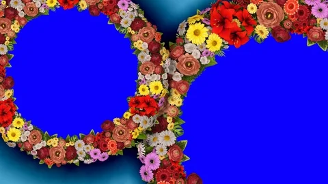 Animation of two rotating rings of flowers on a blue background. The chroma key Stock Footage 104861175