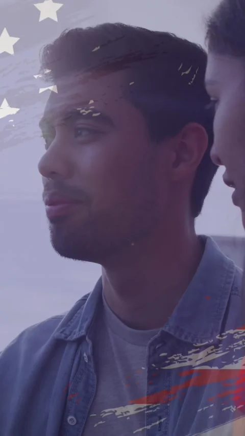 Animation of usa flag effect against couple talking to each other at the beach Stock Footage 344723487