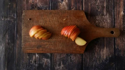 Animation video of apple on cutting board Stock Footage 142113269