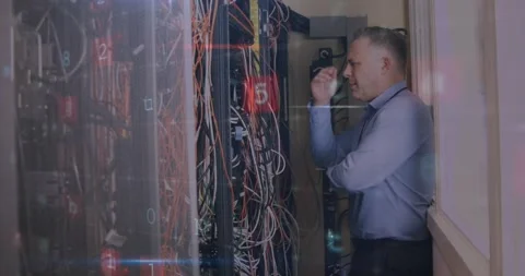 Animation of warning text and data over computer servers and tired caucasian Stock Footage 327713925