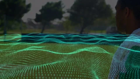 Animation of waves with binary coding over diverse football players on stadium Stock Footage 172327249