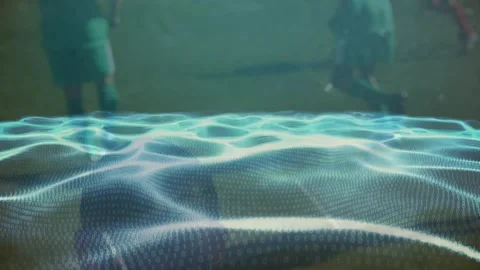 Animation of waves with binary coding over diverse football players on stadium Stock Footage 326425670