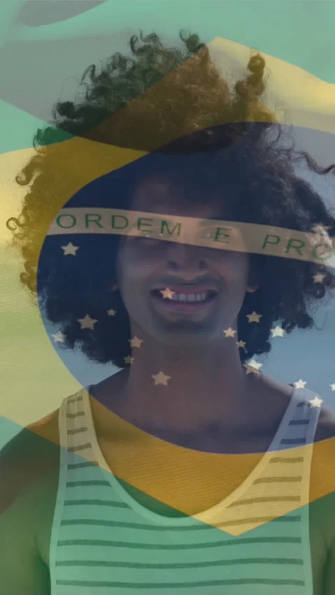 Animation of waving flag of brazil over man standing against ocean at beach Stock Footage 319264532