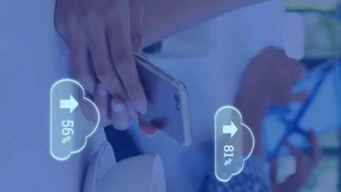 Animation of white clouds uploading data over diverse customers in cafe using Stock Footage 312667882