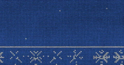 Animation of a white knitted snow on a blue background stock video 動画素材 164908577