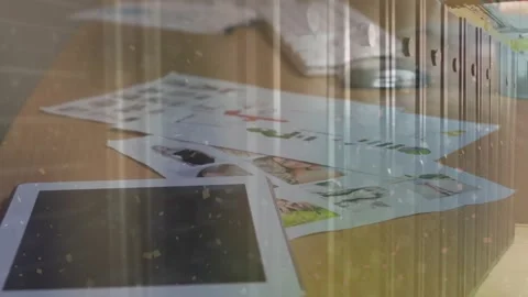 Animation of white particles falling over office equipment on wooden surface Видео 325700144