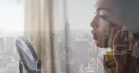 Animation of woman doing make up over cityscape Stock-Footage 329223462