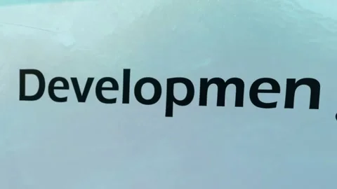 Animation of word Development on light blue background for school project Stock Footage 329289660