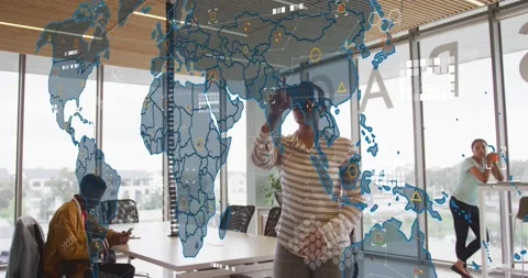 Animation of world map against african american woman wearing vr headset at Stock Footage 252009873